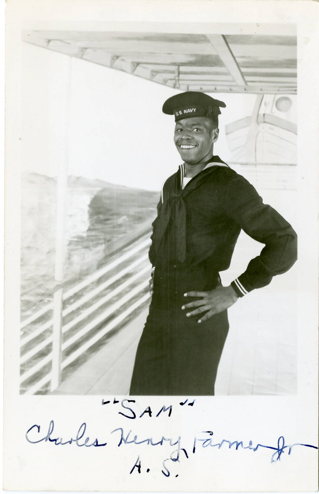 Photograph is a postcard. Image is a portrait of a Navy Sailor. Below the portrait reads "Sam" and the back of the postcard reads "Richmond, VA"